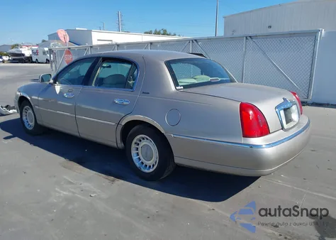 2000 Lincoln Town Car Executive из США, поврежденный, VIN 1LNHM81W4YY791019